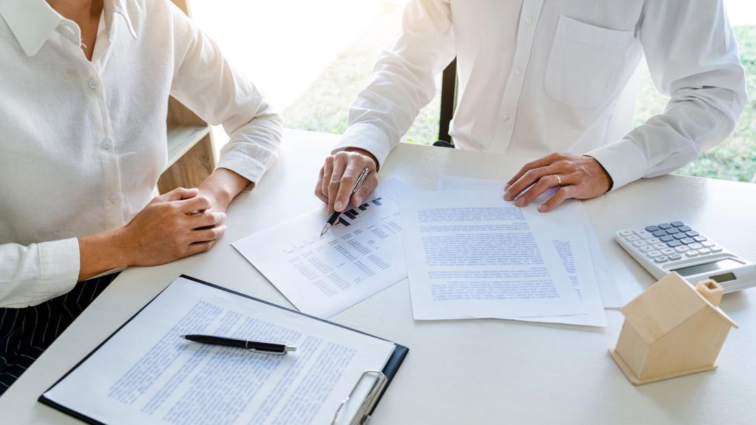 Calculating the costs of buying property: documents and a calculator
